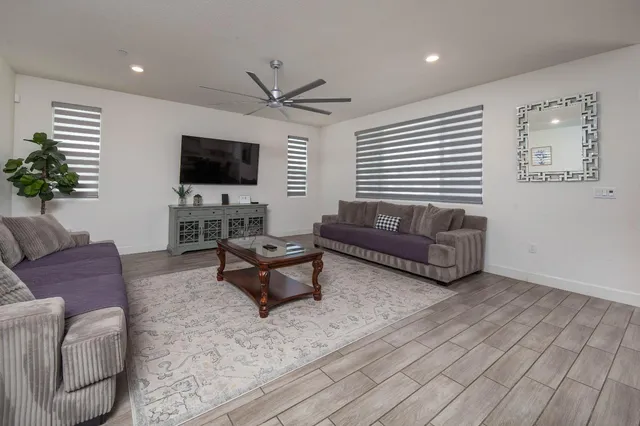 a kitchen with stainless steel appliances a refrigerator sink and cabinets