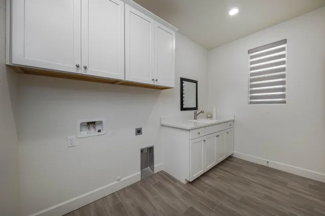 a bedroom with a bed and a ceiling fan