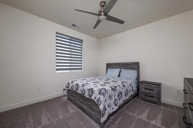 a view of a street with a building in the background