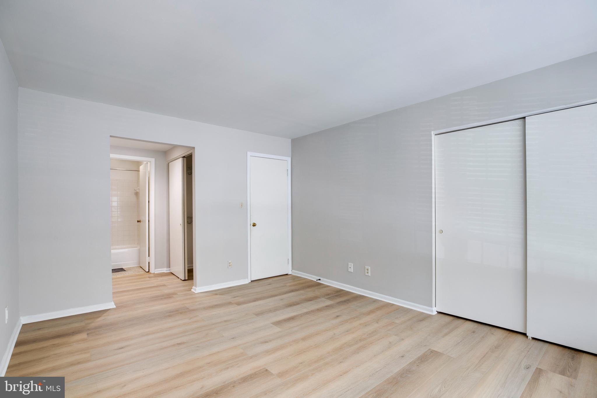 11172 Beaver Trail Court Reston, VA 20191 - Photo 13 of 26 a view of an empty room with wooden floor