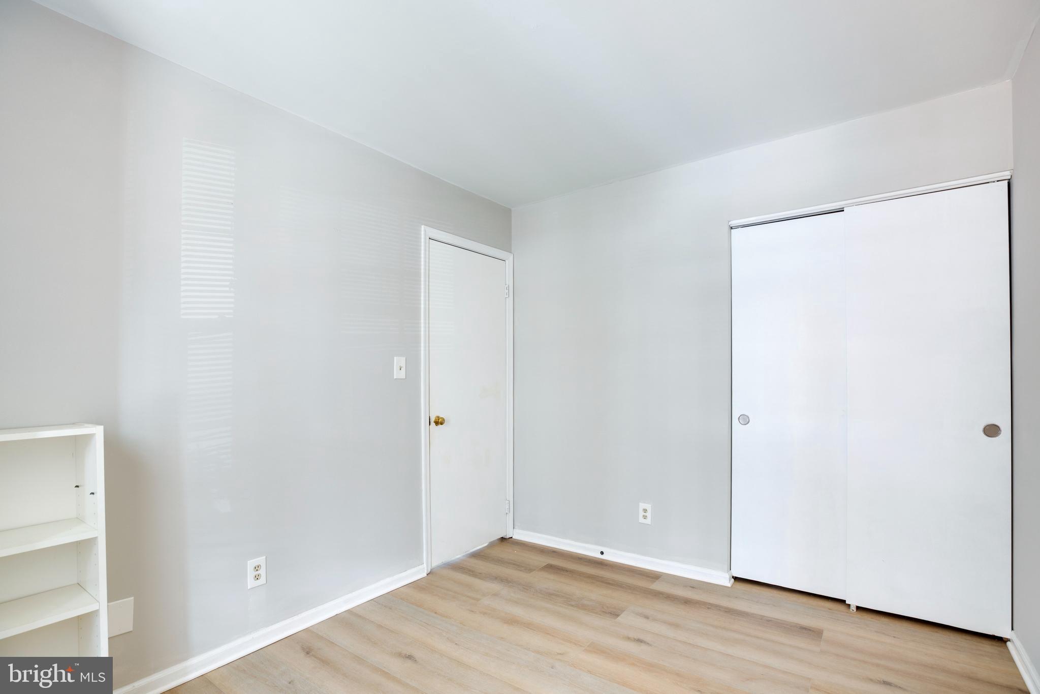 11172 Beaver Trail Court Reston, VA 20191 - Photo 15 of 26 a view of an empty room with wooden floor