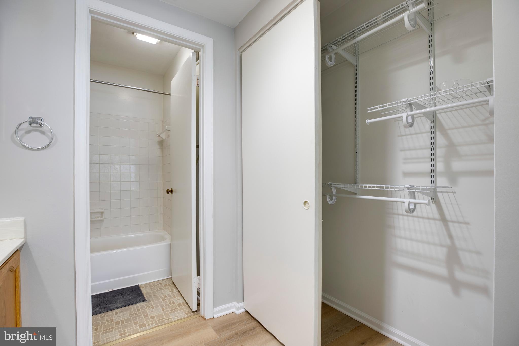 11172 Beaver Trail Court Reston, VA 20191 - Photo 19 of 26 a bathroom with a glass shower door