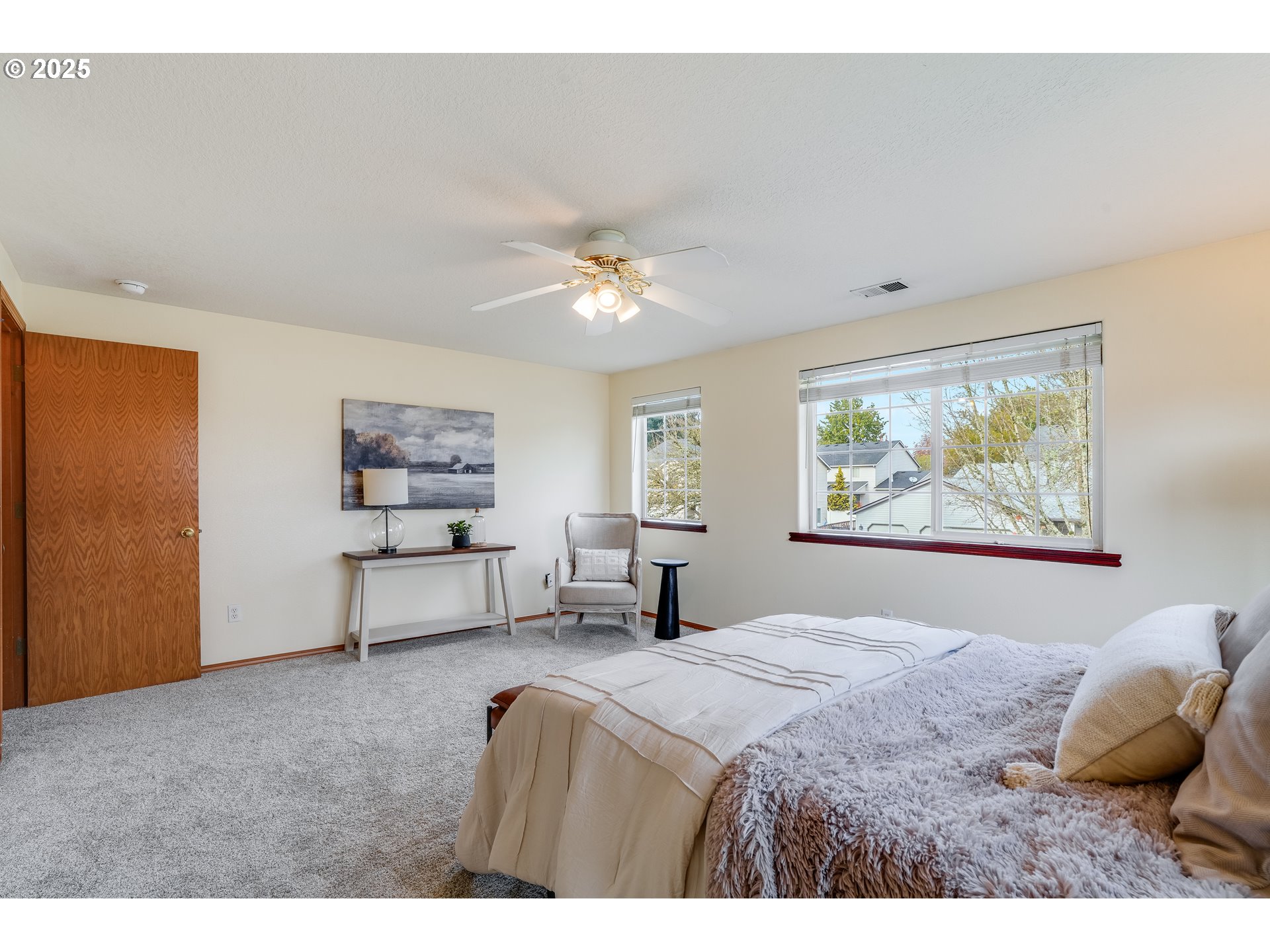 1224 Alyssum Avenue Forest Grove, OR 97116 - Photo 22 of 39 a bedroom with a bed and a painting on the wall
