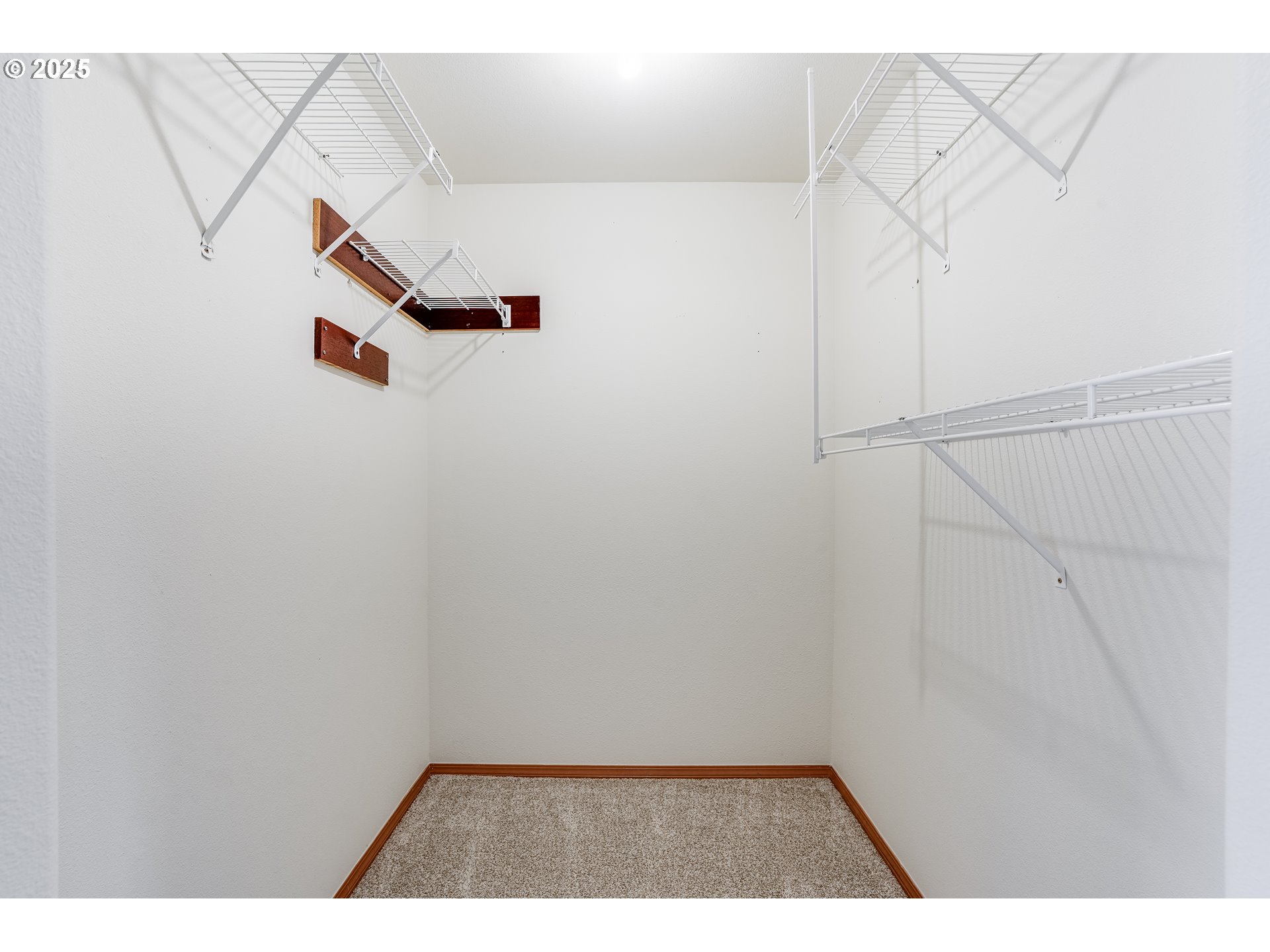 1224 Alyssum Avenue Forest Grove, OR 97116 - Photo 25 of 39 a view of a room with racks on the wall