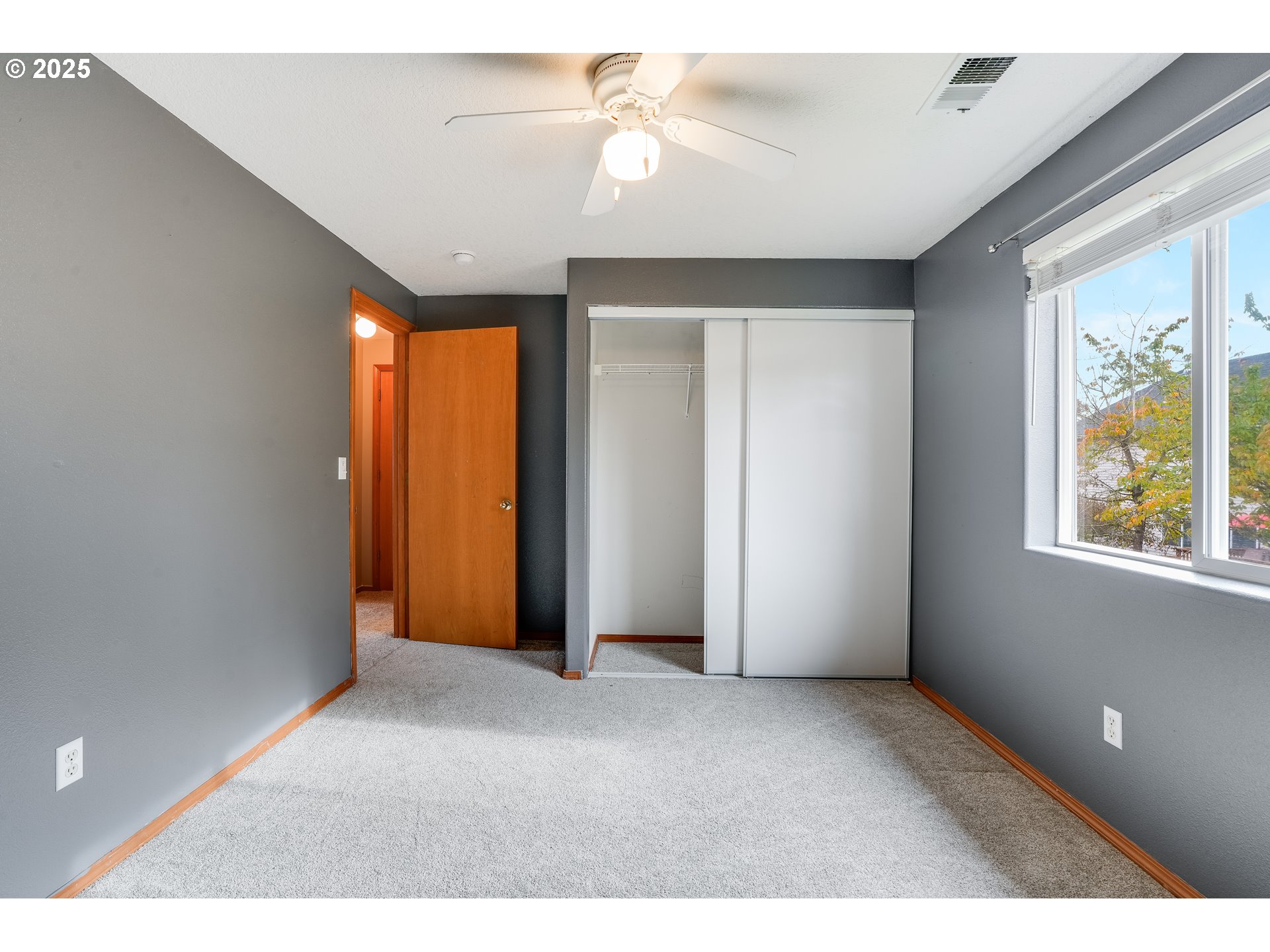 1224 Alyssum Avenue Forest Grove, OR 97116 - Photo 27 of 39 a view interior of a house with a ceiling fan and window