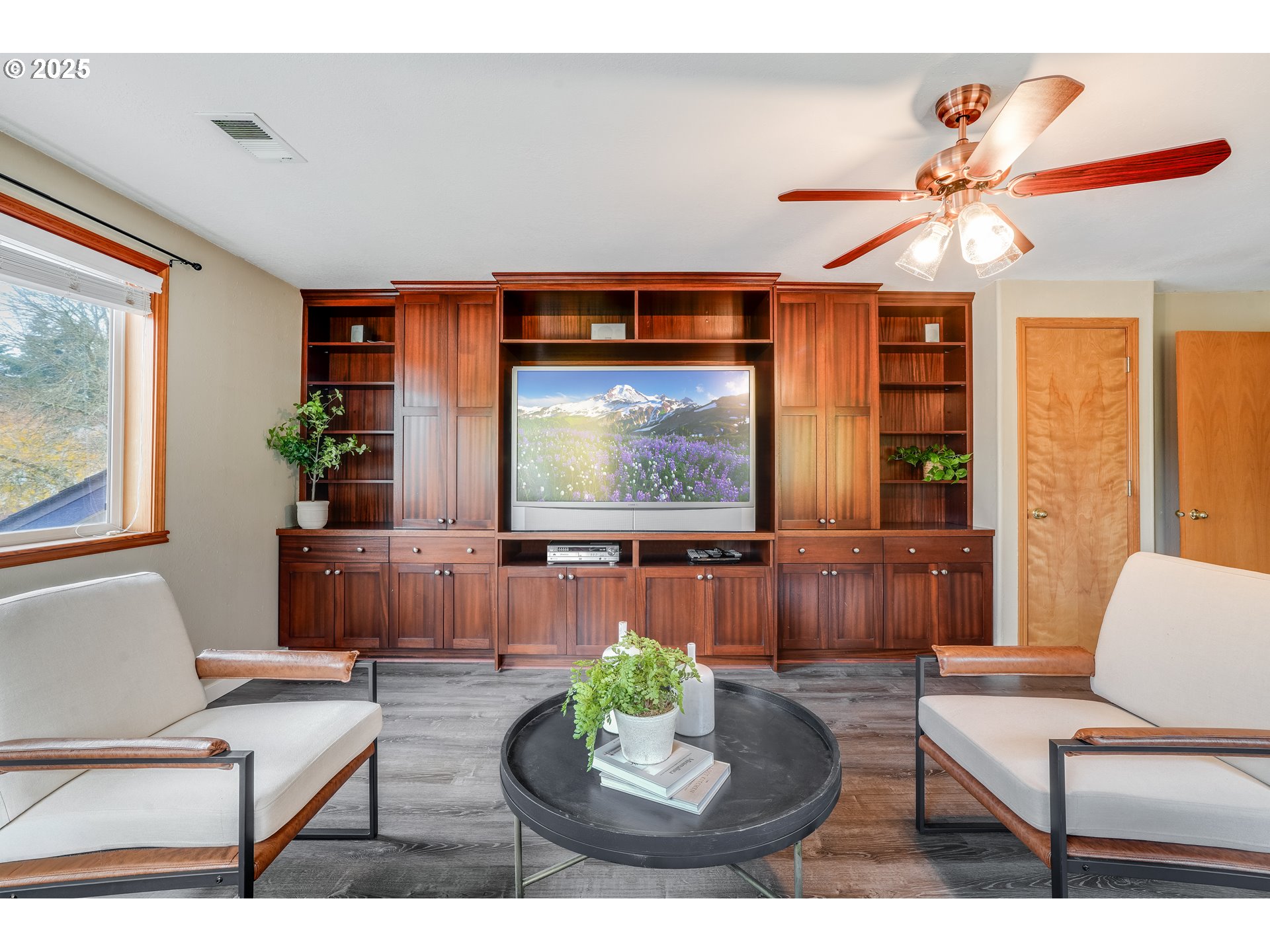 1224 Alyssum Avenue Forest Grove, OR 97116 - Photo 32 of 39 a living room with furniture and a flat screen tv