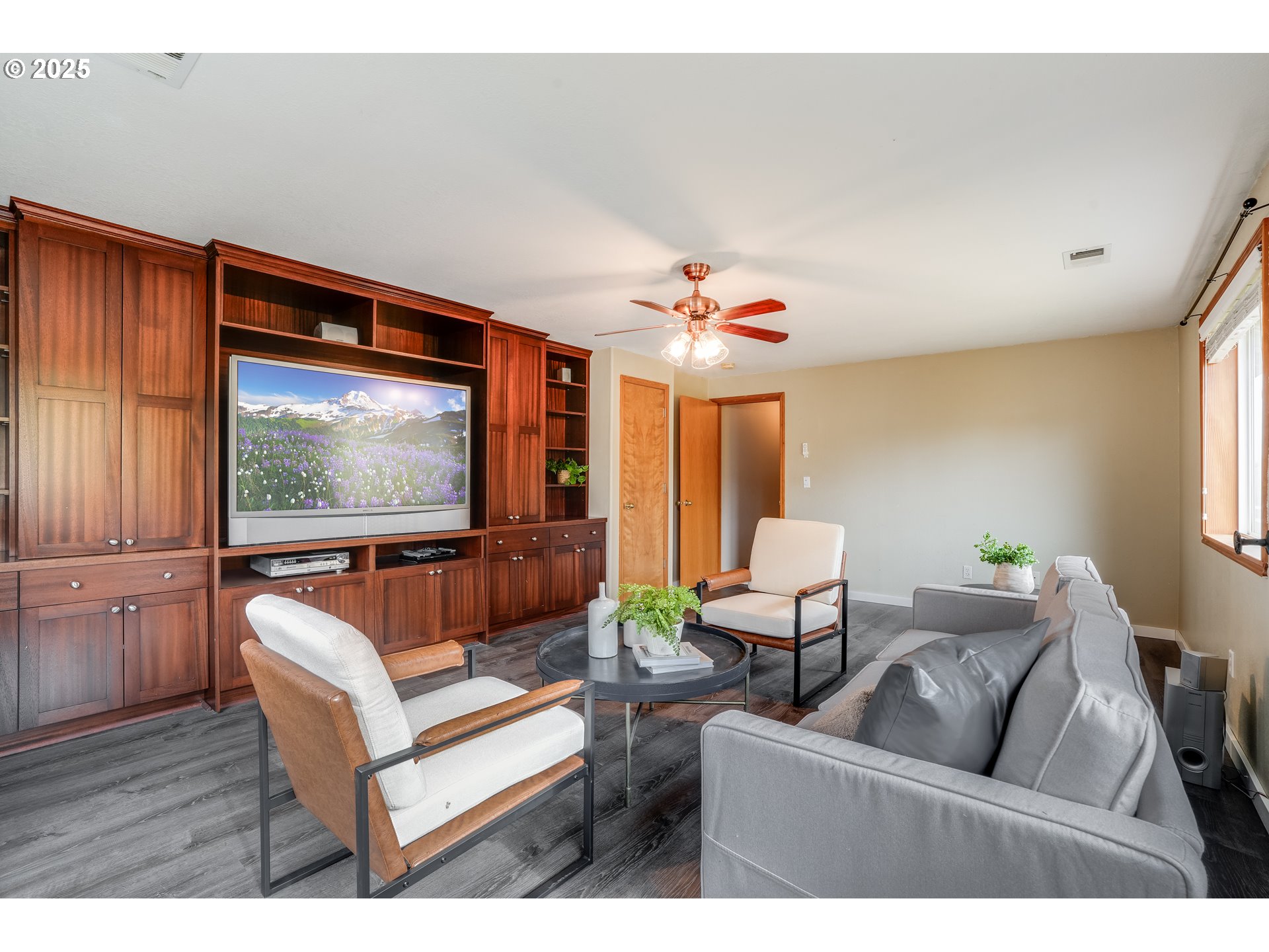 1224 Alyssum Avenue Forest Grove, OR 97116 - Photo 33 of 39 a living room with furniture and a flat screen tv