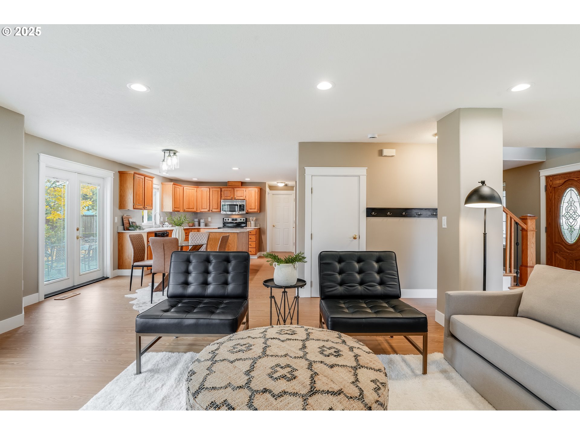 1224 Alyssum Avenue Forest Grove, OR 97116 - Photo 7 of 39 a living room with furniture and a wooden floor