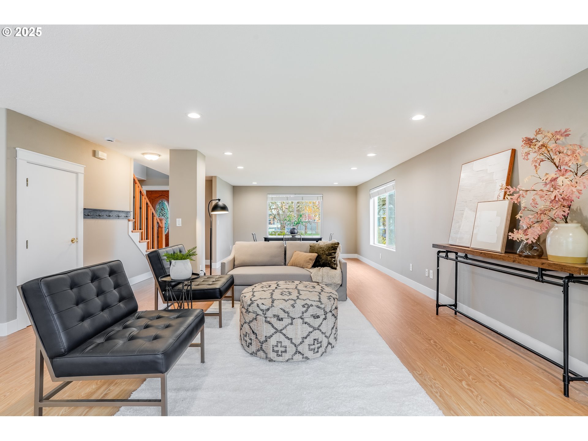 1224 Alyssum Avenue Forest Grove, OR 97116 - Photo 8 of 39 a living room with furniture and a painting on the wall