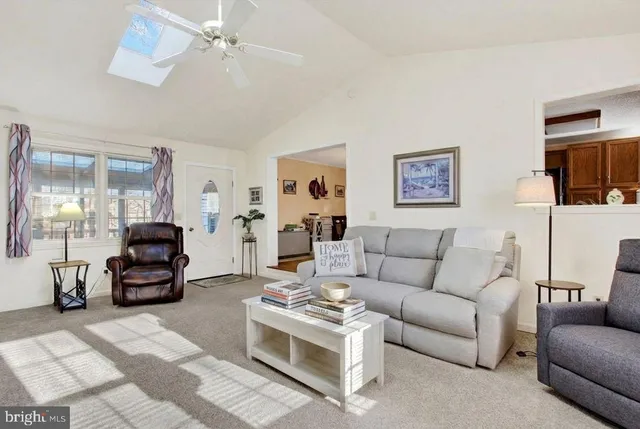 a living room with furniture and a couch