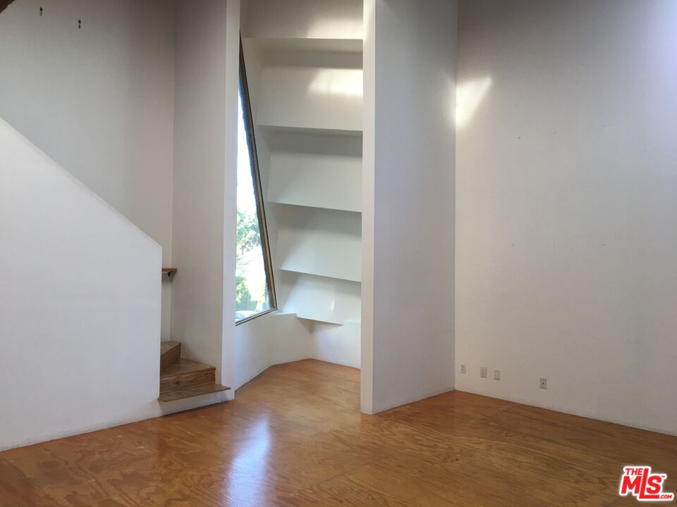 326 Indiana Avenue, Unit A Venice, CA 90291 - Photo 11 of 15 a view of an empty room and wooden floor