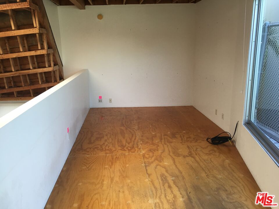 326 Indiana Avenue, Unit A Venice, CA 90291 - Photo 13 of 15 a view of wooden floor and brick wall