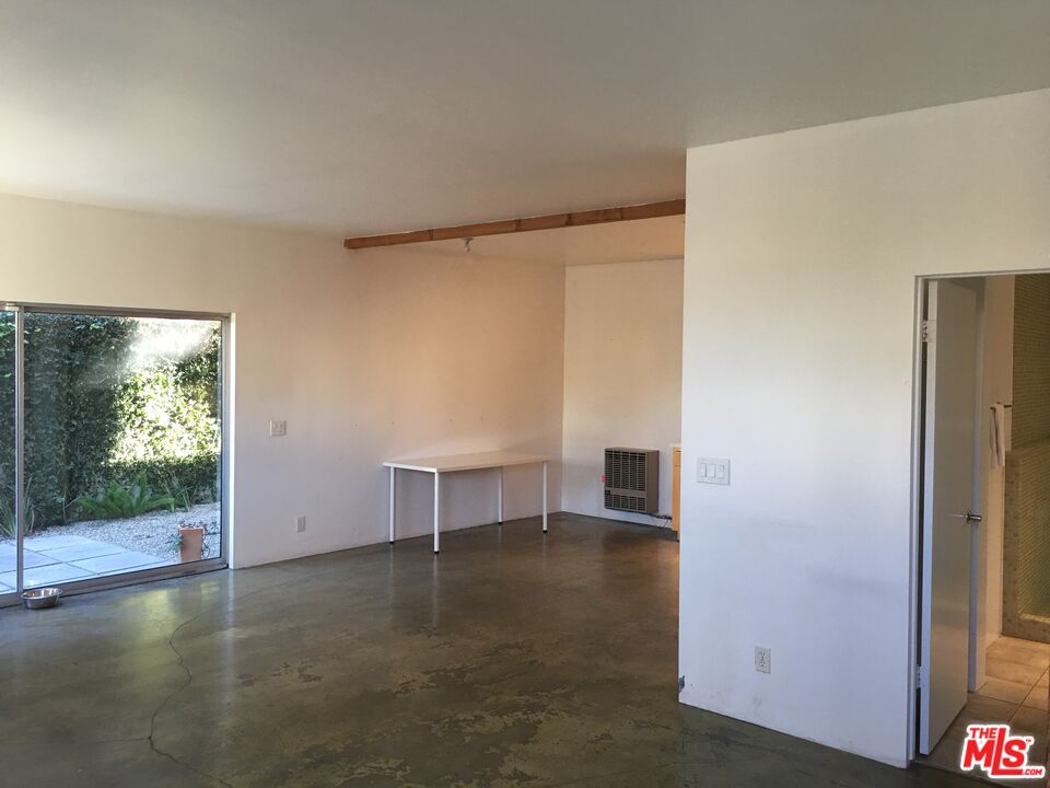 326 Indiana Avenue, Unit A Venice, CA 90291 - Photo 2 of 15 a view of room with window and wooden floor