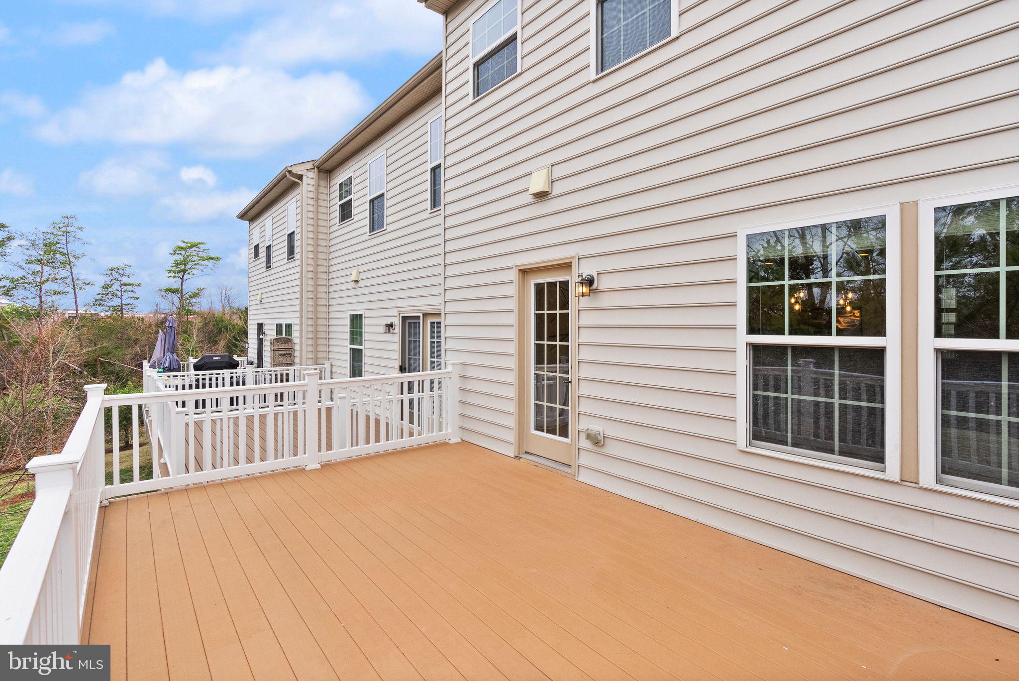 13671 Rockingham Lane Gainesville, VA 20155 - Photo 14 of 45 a view of a house with a balcony