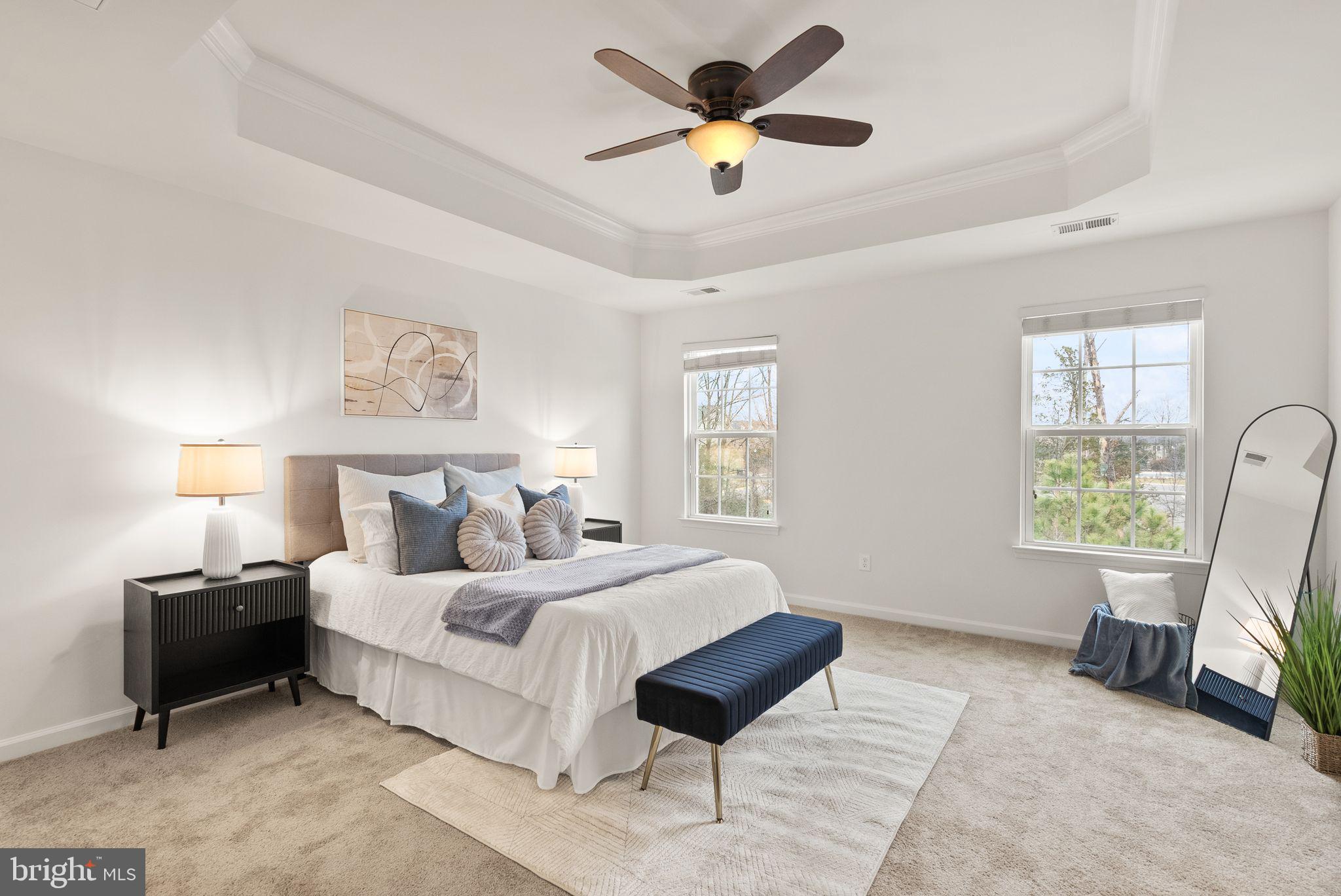 13671 Rockingham Lane Gainesville, VA 20155 - Photo 21 of 45 a bedroom with a bed a couch and a window