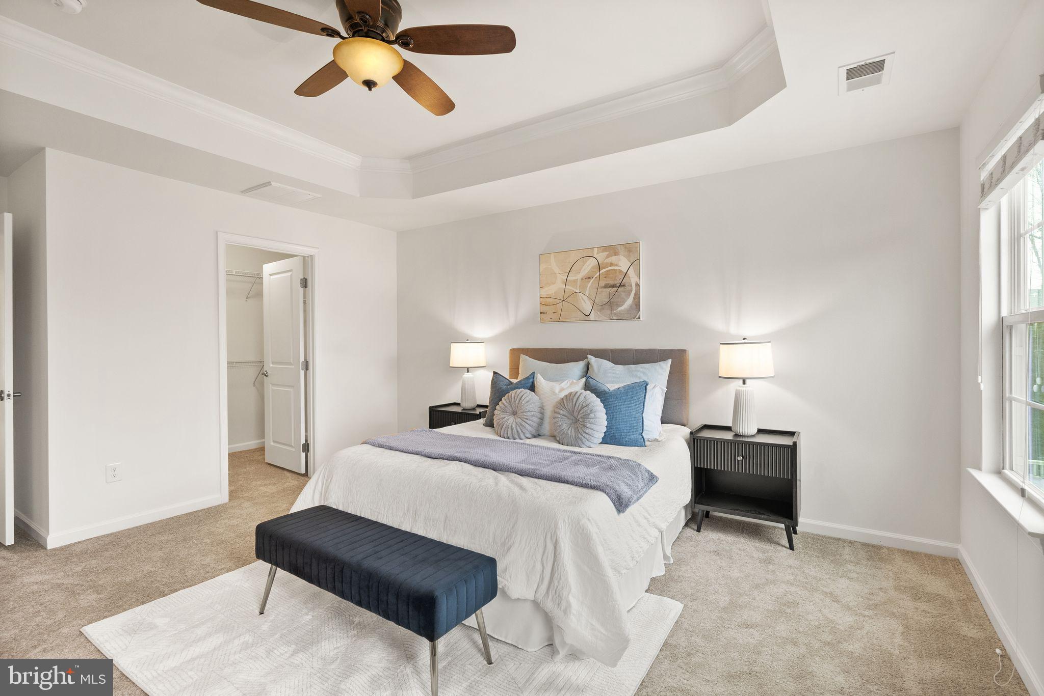 13671 Rockingham Lane Gainesville, VA 20155 - Photo 22 of 45 a bedroom with bed and window