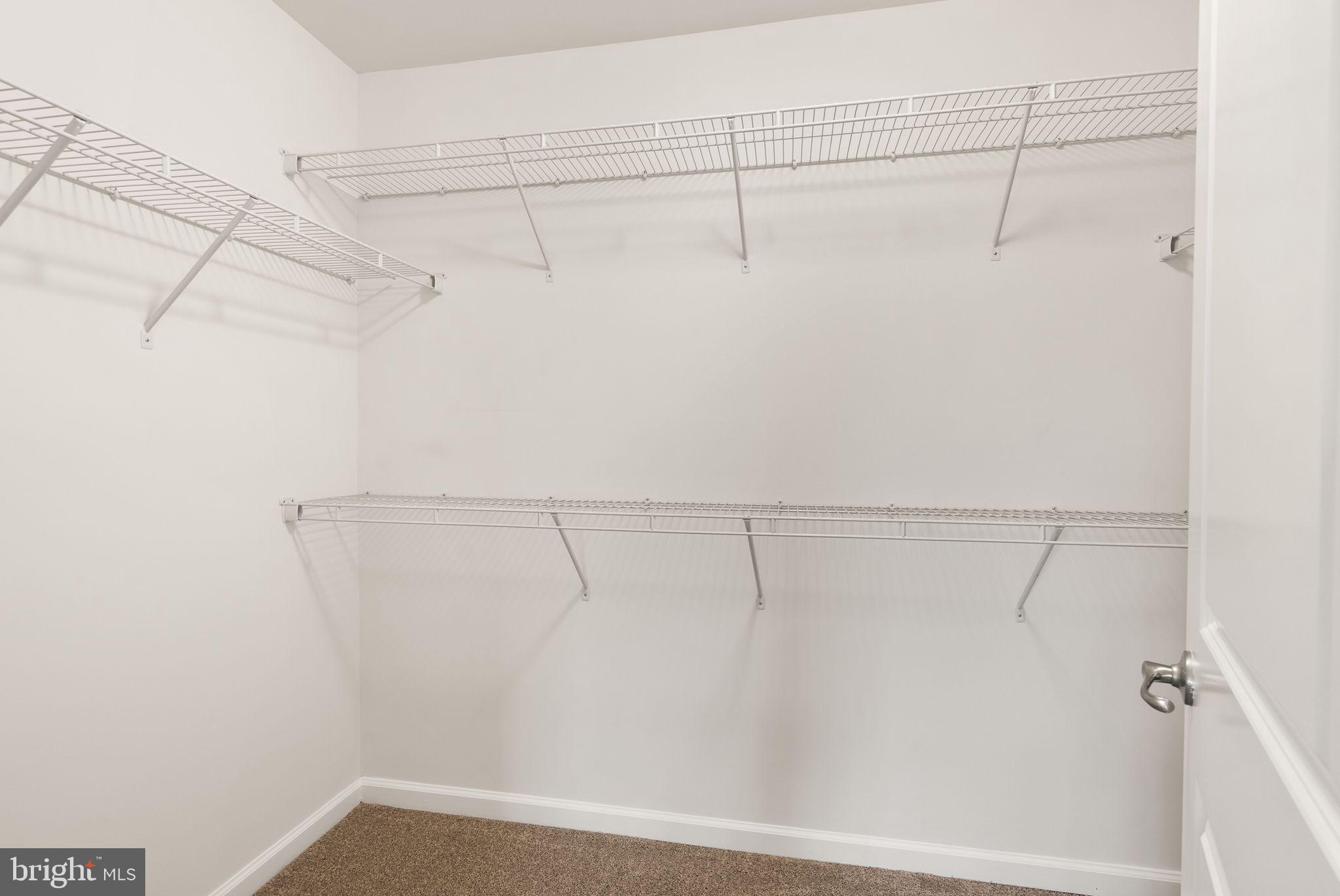 13671 Rockingham Lane Gainesville, VA 20155 - Photo 26 of 45 a view of a room with racks on the wall