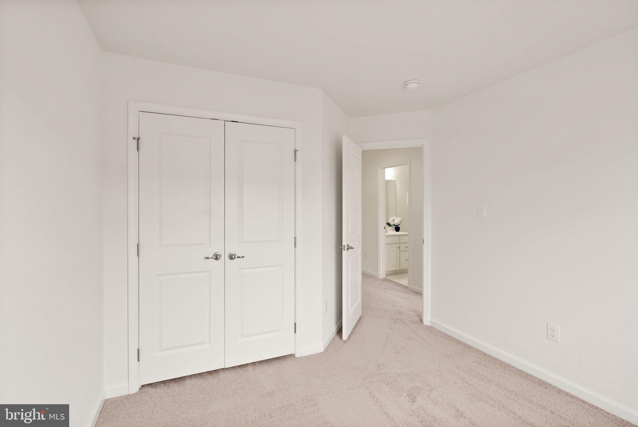 13671 Rockingham Lane Gainesville, VA 20155 - Photo 31 of 45 a view of an empty room and a bathroom