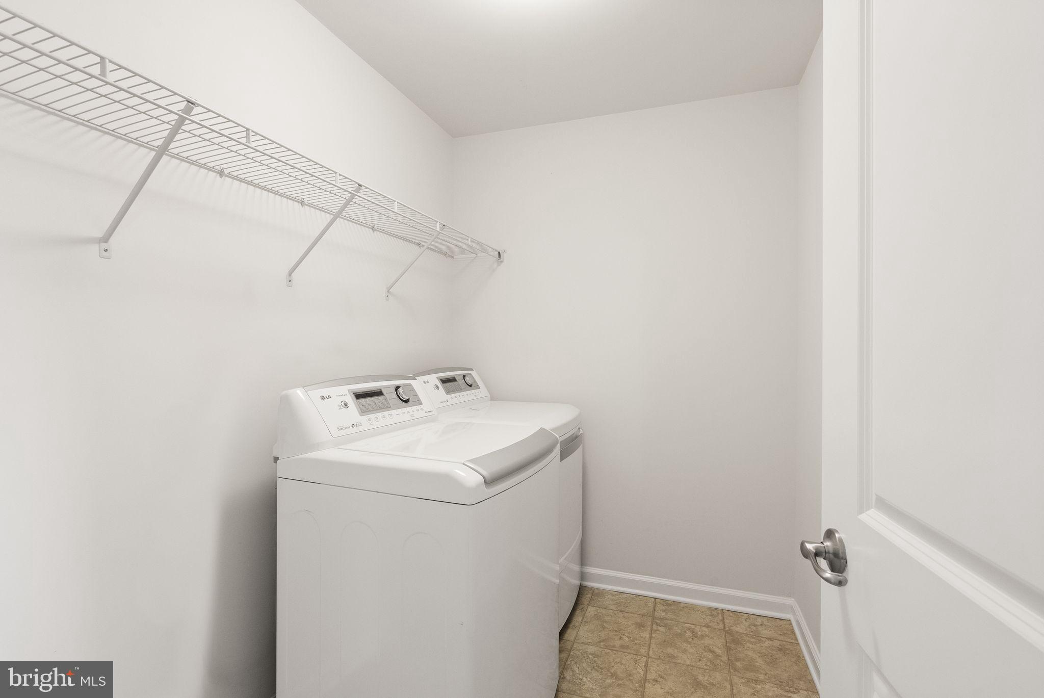 13671 Rockingham Lane Gainesville, VA 20155 - Photo 33 of 45 a utility room with dryer and washer