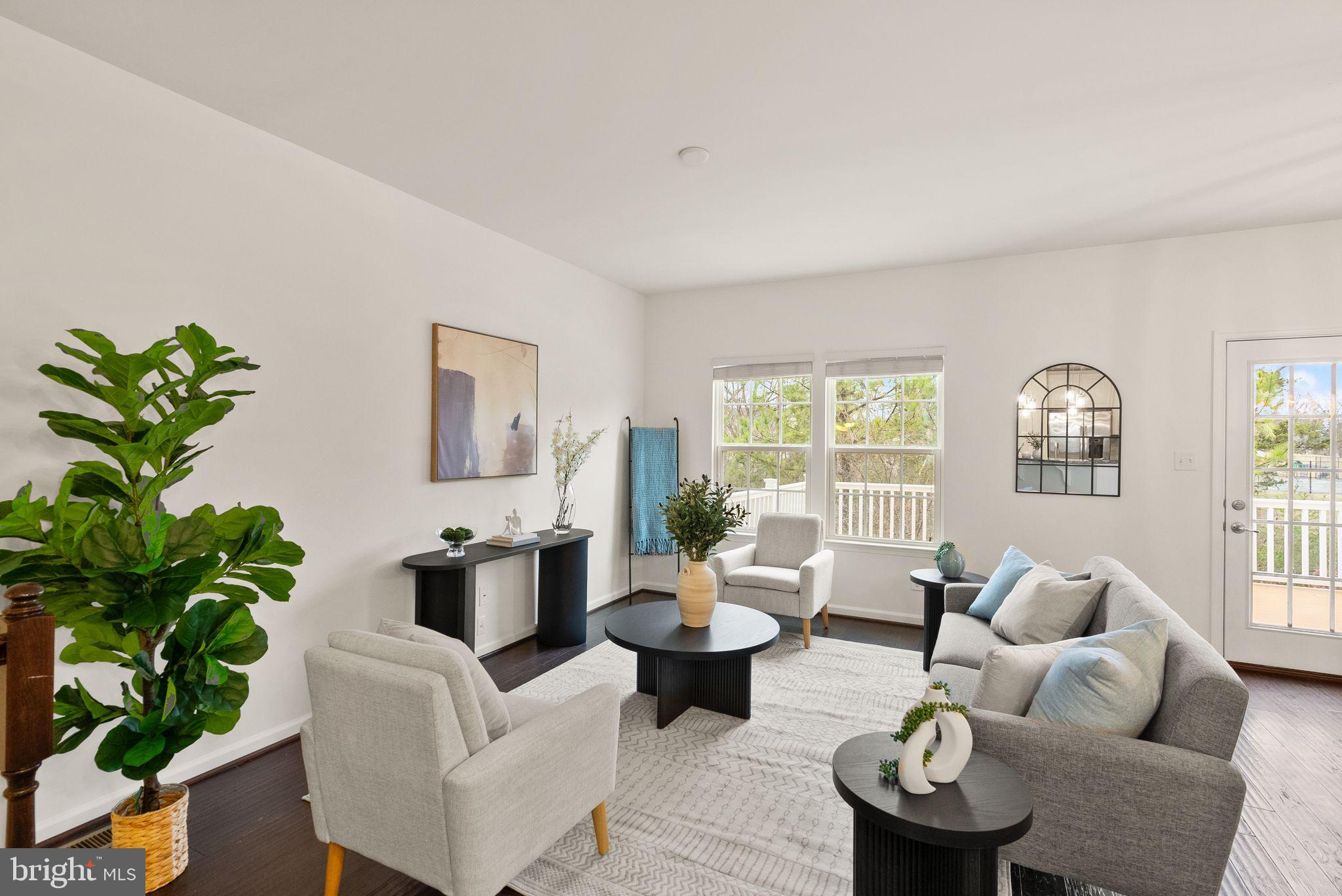 13671 Rockingham Lane Gainesville, VA 20155 - Photo 10 of 45 a living room with furniture potted plant and a window