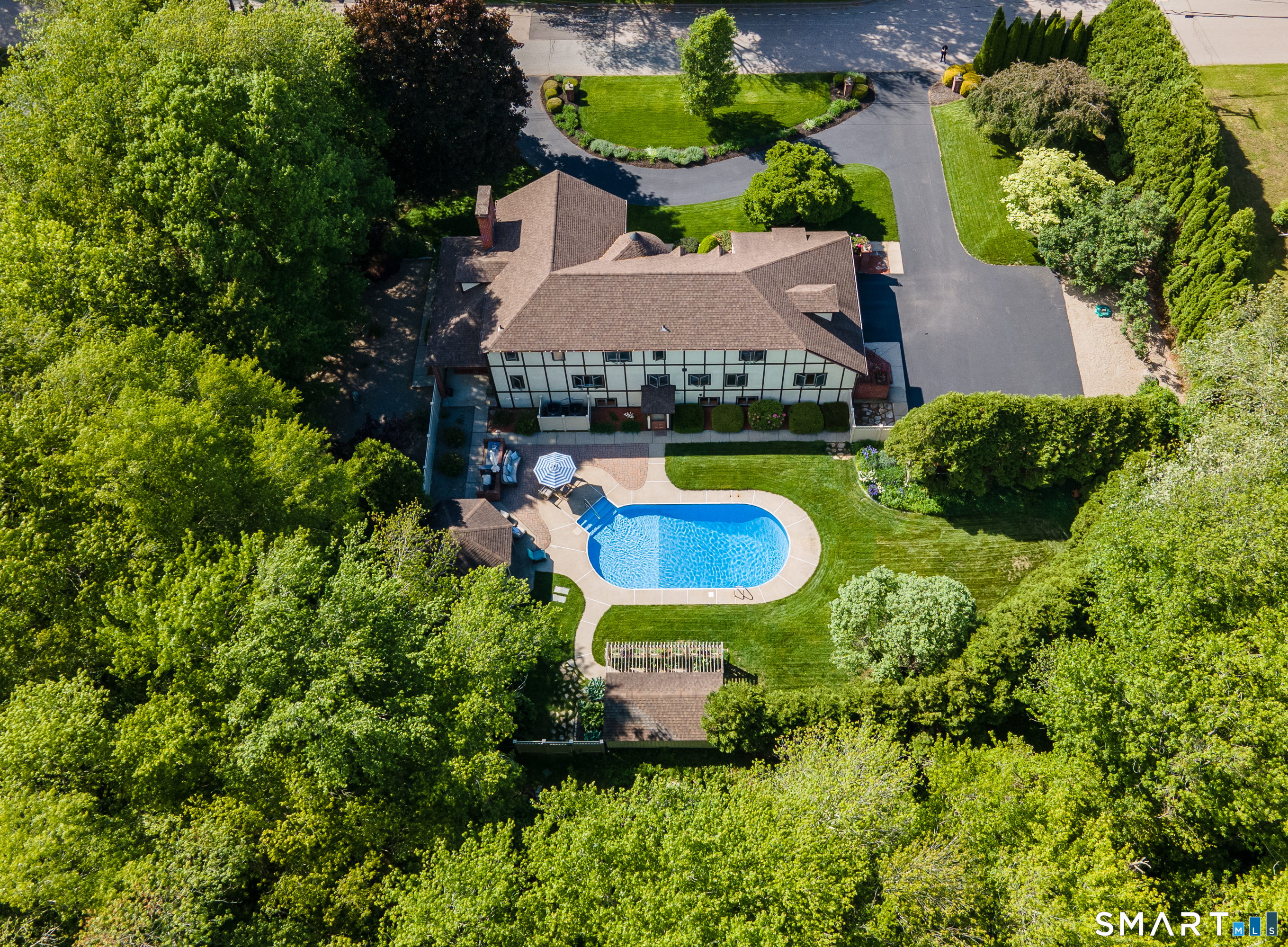 25 Stony Ridge Road Norwich, CT 06360 - Photo 2 of 40 an aerial view of a house with swimming pool outdoor seating and yard