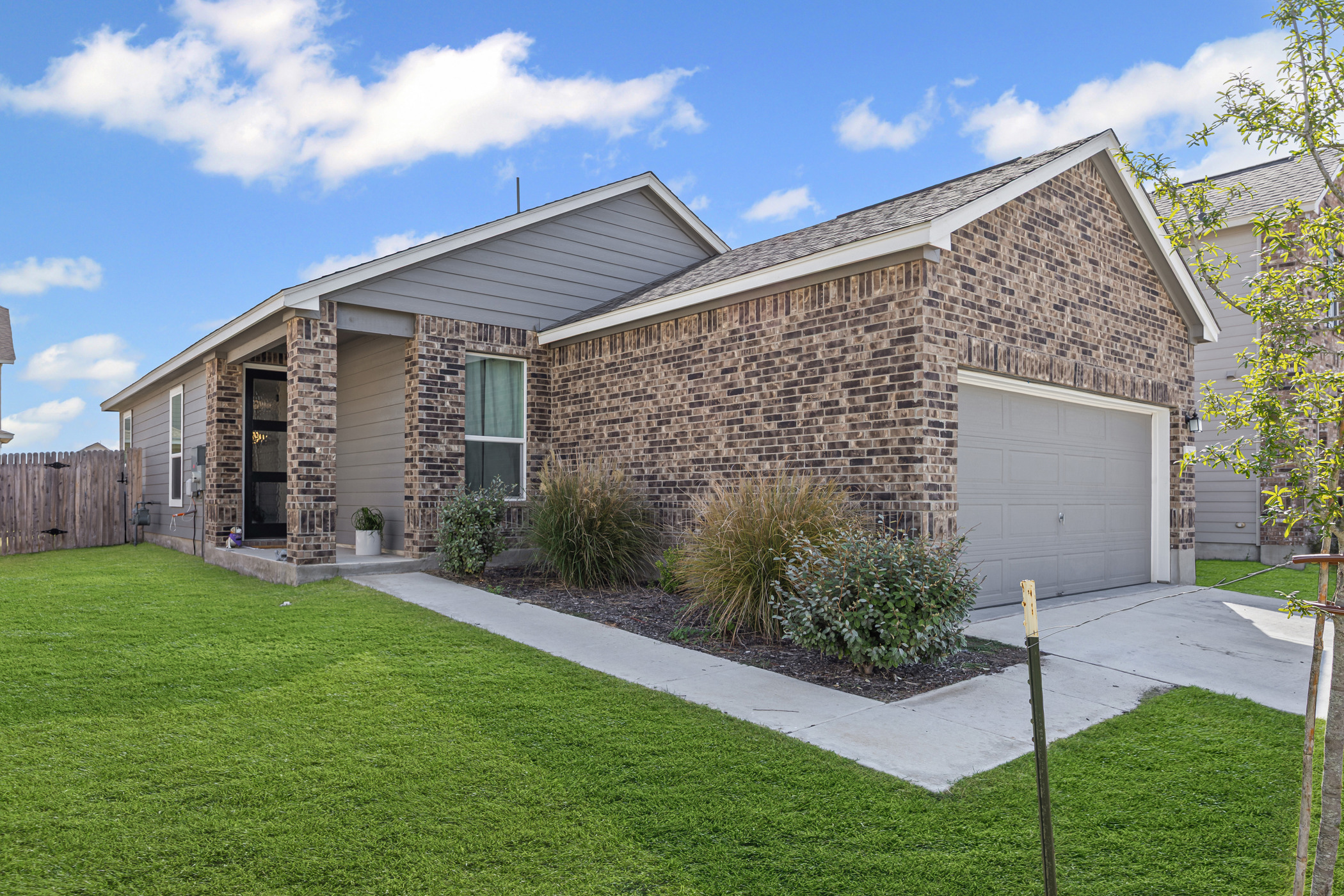 222 Summit Drive Lockhart, TX 78644 - Photo 2 of 31 a view of a house with a yard