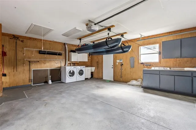 an aerial view of a house with yard