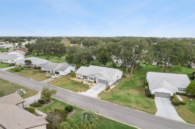 a view of swimming pool with a lounge chair