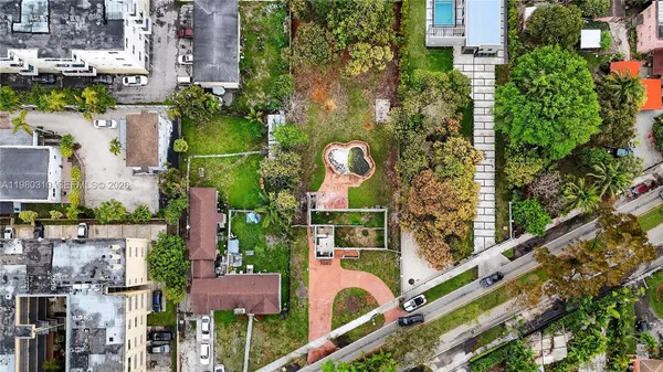 an aerial view of a house with a garden