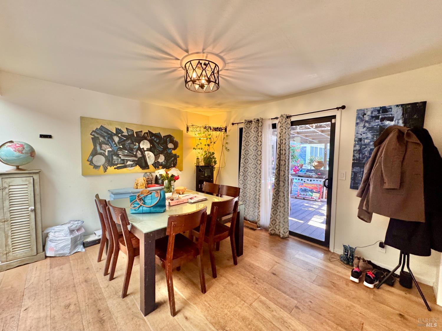 55-61 Park Road Fairfax, CA 94930 - Photo 13 of 26 a view of a dining room with furniture and wooden floor