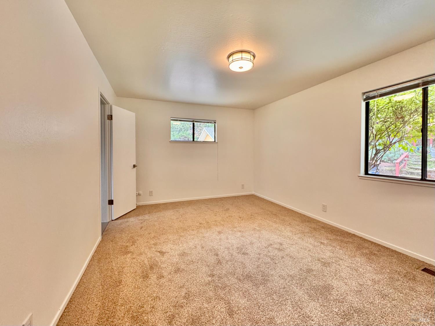 55-61 Park Road Fairfax, CA 94930 - Photo 15 of 26 an empty room with windows