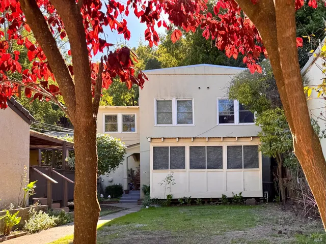 a house view with a garden space