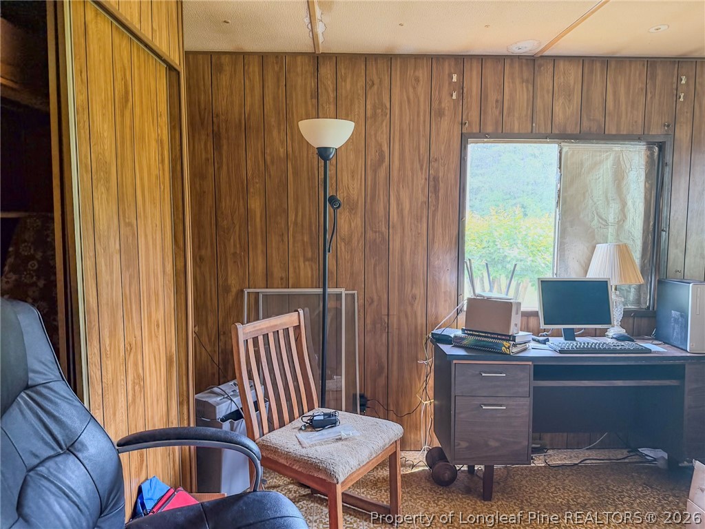 1308 Mac D Road Orrum, NC 28369 - Photo 14 of 32 a living room with a window and furniture
