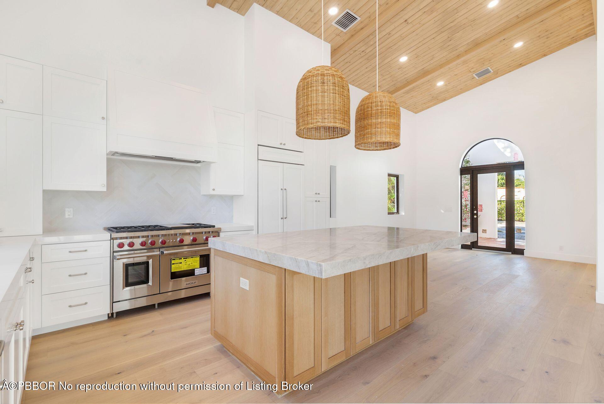 320 Plymouth Road West Palm Beach, FL 33405 - Photo 12 of 39 a kitchen with cabinets and stainless steel appliances