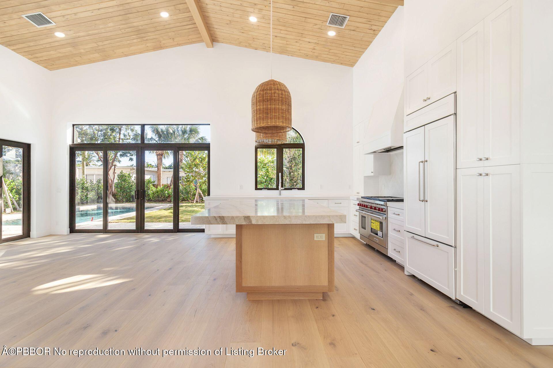 320 Plymouth Road West Palm Beach, FL 33405 - Photo 13 of 39 a view of a kitchen with a sink and cabinets