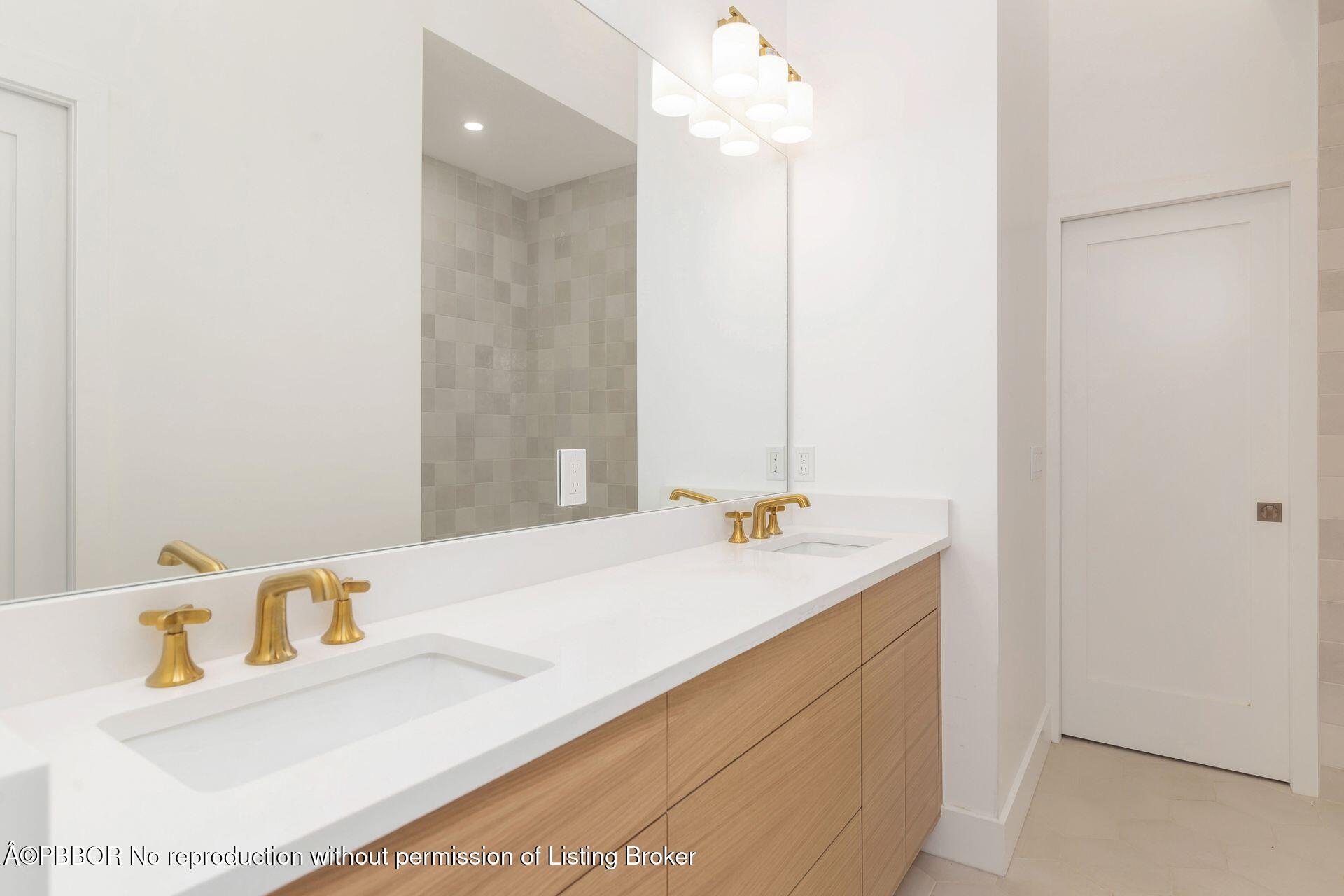 320 Plymouth Road West Palm Beach, FL 33405 - Photo 15 of 39 a bathroom with a sink and a mirror