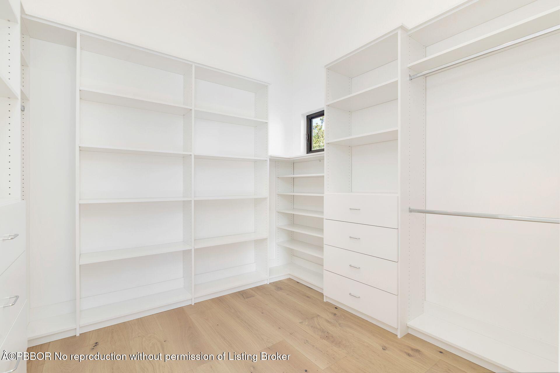 320 Plymouth Road West Palm Beach, FL 33405 - Photo 16 of 39 a view of walk in closet with empty racks