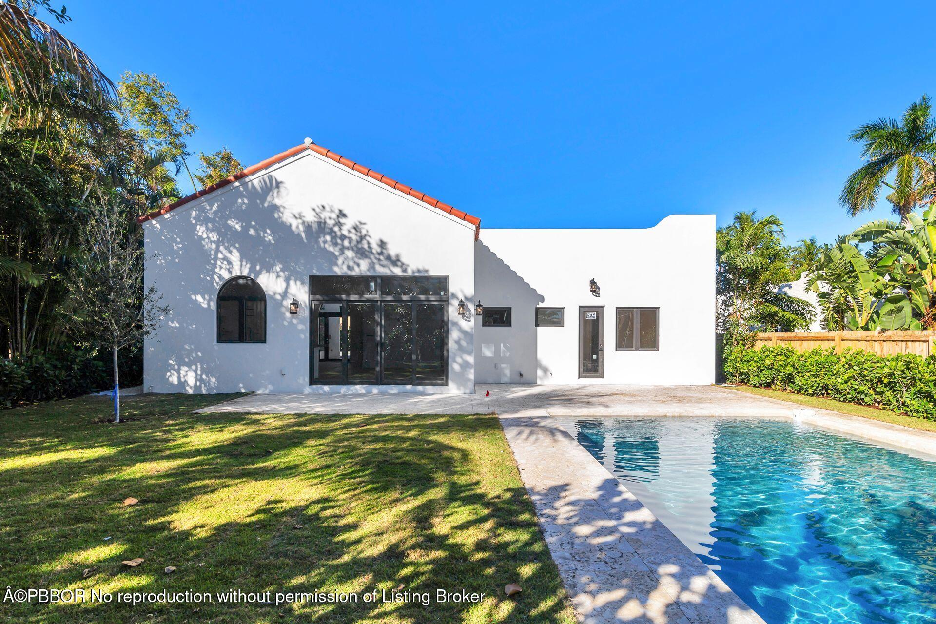 320 Plymouth Road West Palm Beach, FL 33405 - Photo 27 of 39 a view of swimming pool of the house with yard and swimming pool