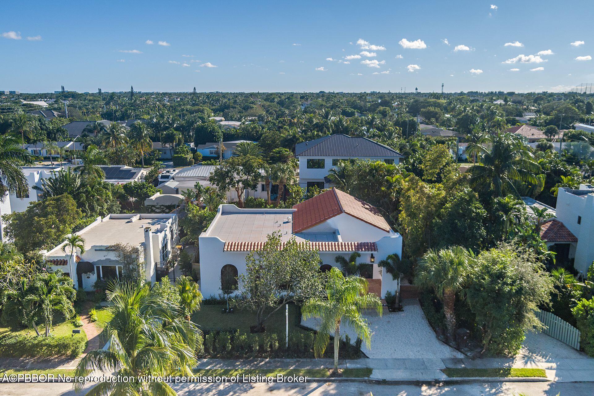 320 Plymouth Road West Palm Beach, FL 33405 - Photo 31 of 39 a aerial view of a house with table and chairs plants