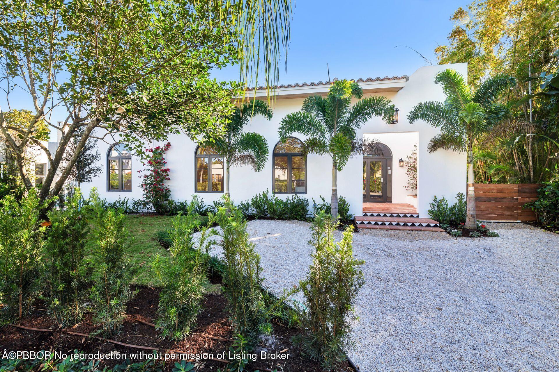 320 Plymouth Road West Palm Beach, FL 33405 - Photo 34 of 39 a front view of a house with garden