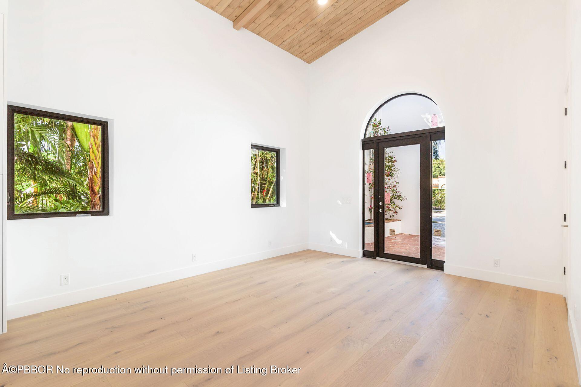 320 Plymouth Road West Palm Beach, FL 33405 - Photo 4 of 39 an empty room with windows