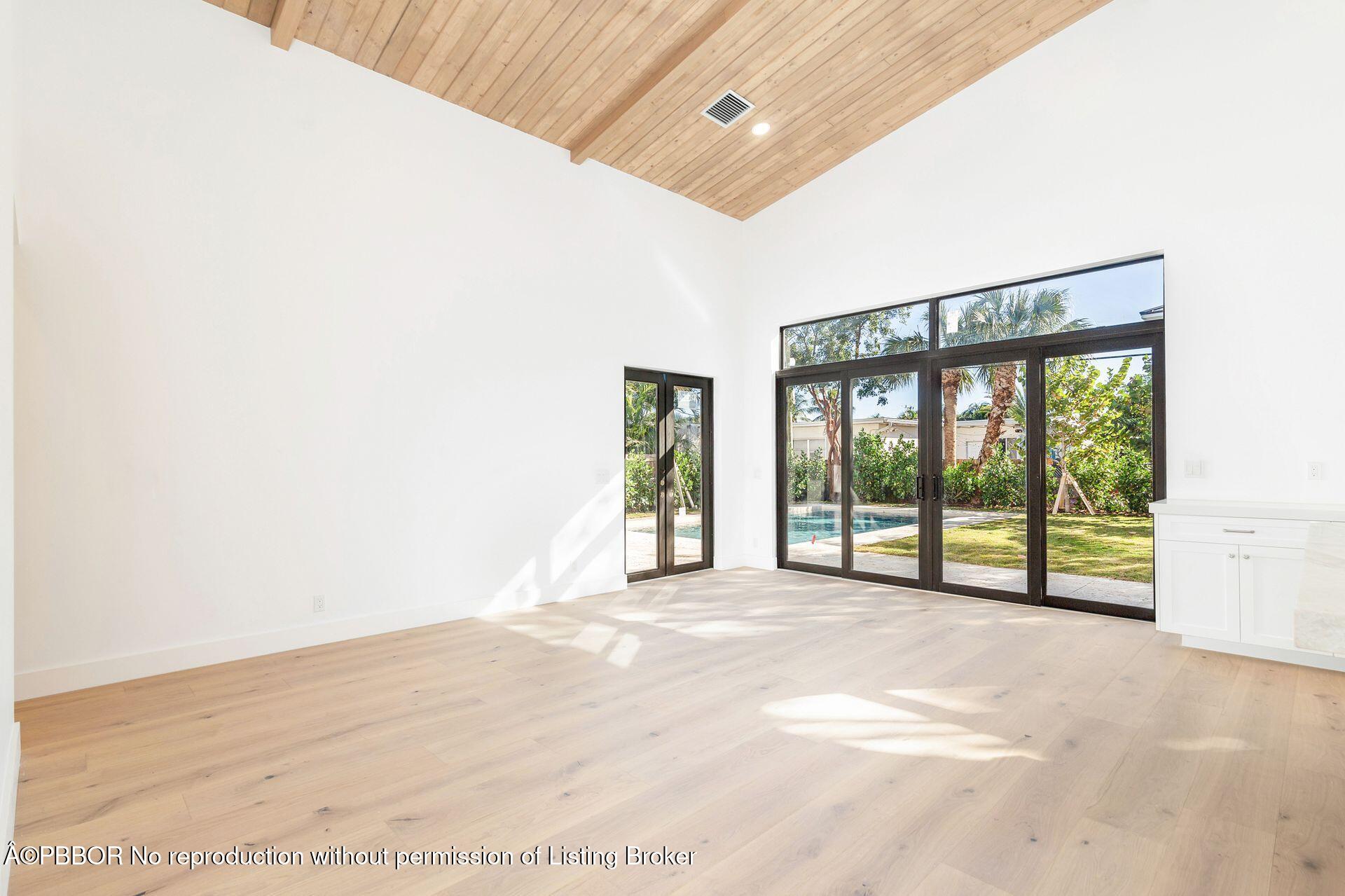 320 Plymouth Road West Palm Beach, FL 33405 - Photo 7 of 39 a view of an empty room with a balcony