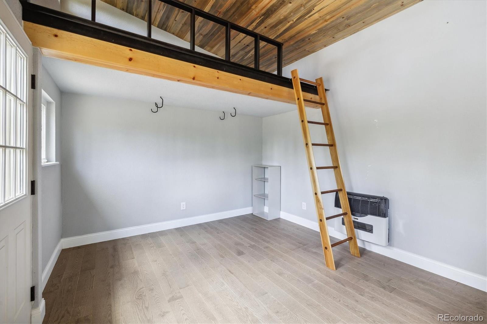 3450 Smith Hill Road Black Hawk, CO 80422 - Photo 13 of 26 a view of an entryway with wooden floor