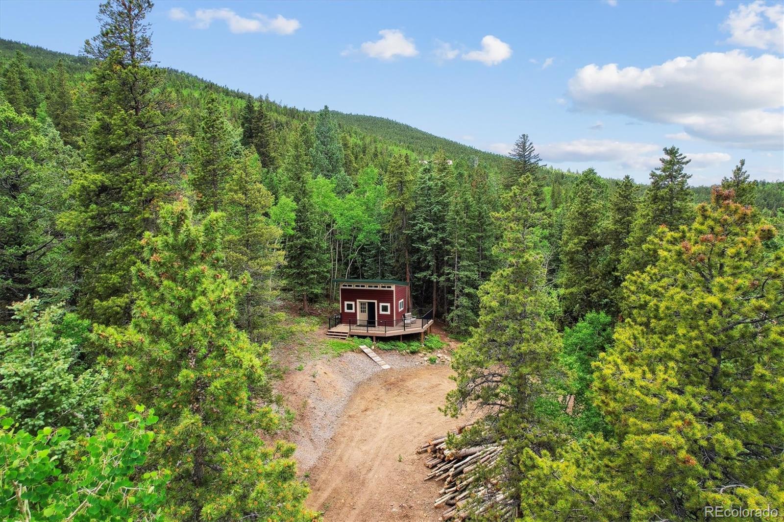 3450 Smith Hill Road Black Hawk, CO 80422 - Photo 7 of 26 a view of a balcony with an outdoor space and seating area