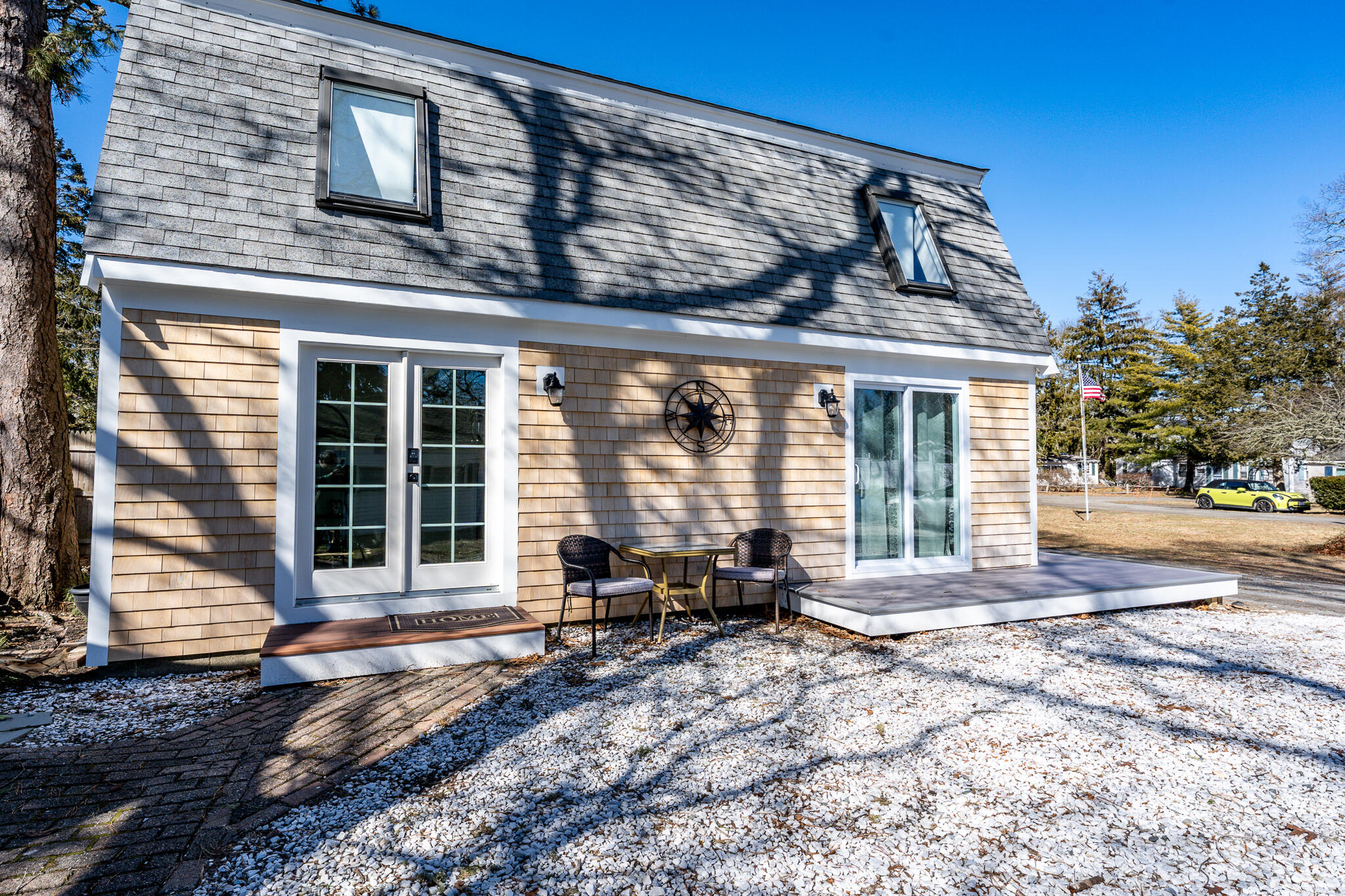9 Bells Neck Road, Unit 10 Harwich, MA 02671 - Photo 36 of 39 a view of a house with a backyard