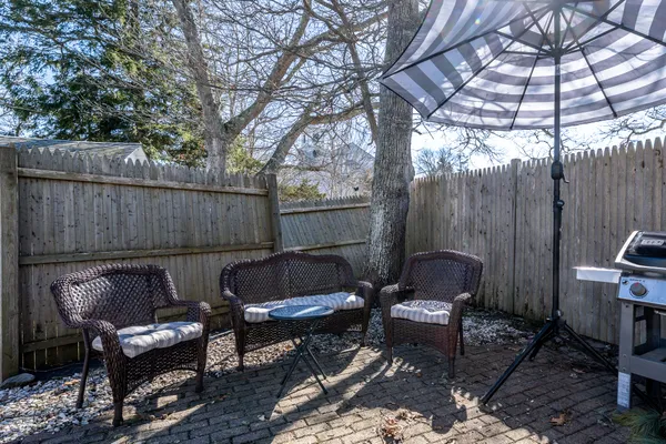 a view of a chairs in the patio