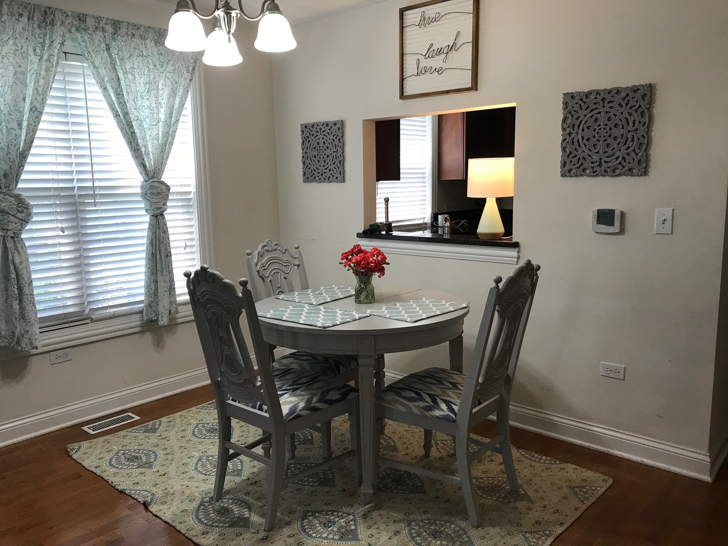 43 Foxcroft Road, Unit 123 Naperville, IL 60565 - Photo 4 of 11 a view of a dining room with furniture and wooden floor