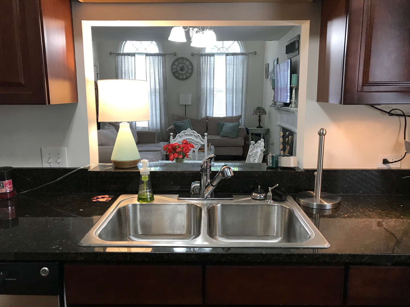 43 Foxcroft Road, Unit 123 Naperville, IL 60565 - Photo 6 of 11 a kitchen sink with granite countertop a sink and cabinets