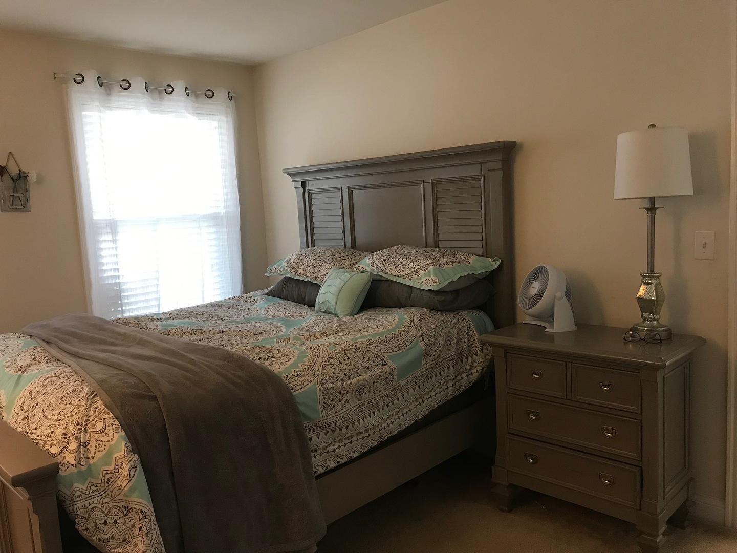 43 Foxcroft Road, Unit 123 Naperville, IL 60565 - Photo 10 of 11 a bedroom with a bed and a window