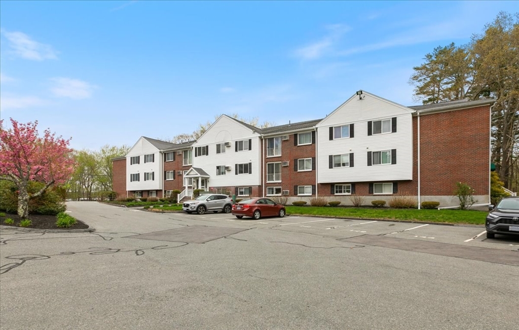 25 Clark's Road, Unit 101 Amesbury, MA 01913 - Photo 25 of 32 a view of street with parked cars